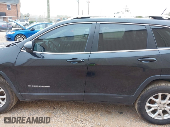 2014 Jeep Cherokee Latitude with VIN 1C4PJLCB4EW175236, listed as a IAAI auction lot 40788919 with 174,324 mi miles and . Bid and sale history available at DreamBid. Image 14.