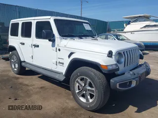 2018 Jeep Wrangler Unlimited Sahara z VIN 1C4HJXEG2JW305982, wystawiony jako IAAI lot #41797076 z przebiegiem 97 527 mil mil oraz . Historia ofert i sprzedaży dostępna na DreamBid. Obrazek 1.