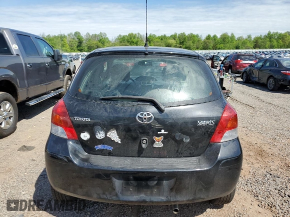 2009 Toyota Yaris with VIN JTDKT903795233081, listed as a Copart auction lot 56407165 with 172,631 mi miles and Clean Title. Bid and sale history available at DreamBid. Image 6.