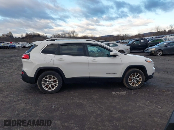 2016 Jeep Cherokee Latitude z VIN 1C4PJMCB7GW118036, wystawiony jako IAAI lot #41232593 z przebiegiem 114 880 mil mil oraz . Historia ofert i sprzedaży dostępna na DreamBid. Obrazek 13.