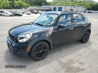 2012 MINI Countryman S with VIN WMWZC5C55CWL56879, listed as a Copart auction lot 63572725 with 86,979 mi miles and Clean title. Bid and sale history available at DreamBid. Image 1.