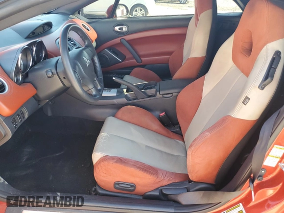 2011 Mitsubishi Eclipse GT with VIN 4A37L3ET3BE001981, listed as a Copart auction lot 85119964 with 102,374 mi miles and Salvage Title. Bid and sale history available at DreamBid. Image 7.