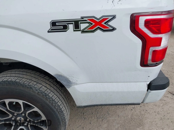 2018 Ford F-150 XL with VIN 1FTEW1C52JKC49228, listed as a IAAI auction lot 42162616 with 148,329 mi miles. Bid and sale history available at carsss.com. Image 6.