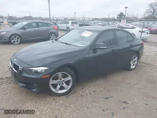 2014 BMW 3 Series 328i xDrive with VIN WBA3B3C54EJ983067, listed as a IAAI auction lot 40857310 with 156,592 mi miles. Bid and sale history available at carsss.com. Image 17.