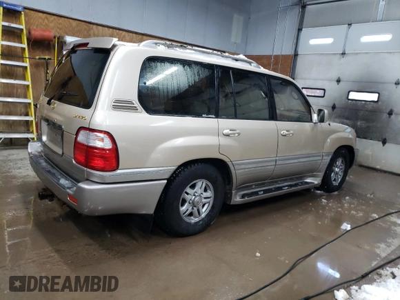 2001 Lexus LX 470 z VIN JTJHT00W213507042, wystawiony jako Copart lot #84236804 z przebiegiem 179 706 mil mil oraz Tytuł czysty. Historia ofert i sprzedaży dostępna na DreamBid. Obrazek 3.