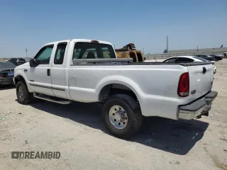 2000 Ford F-250 XL с VIN 1FTNX21F0YED32261, выставлен на аукционе Copart как лот 57243325 с пробегом 306 868 миль миль и Чистый • Clean title. История ставок и продаж доступна на DreamBid. Изображение 2.