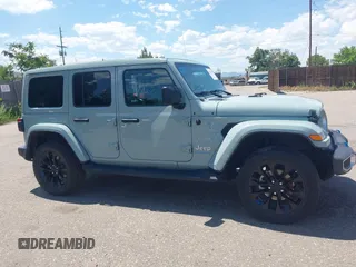2023 Jeep Wrangler Sahara with VIN 1C4JJXP68PW627007, listed as a IAAI auction lot 42474745 with 57,912 mi miles and . Bid and sale history available at DreamBid. Image 13.