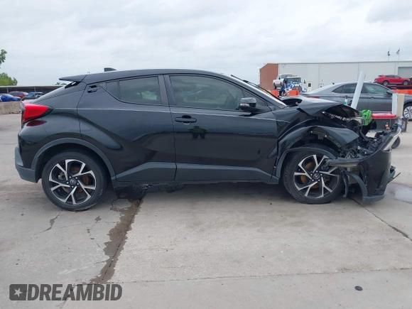 2020 Toyota C-HR LE z VIN JTNKHMBX1L1074377, wystawiony jako IAAI lot #42135672 z przebiegiem 88 846 mil mil oraz . Historia ofert i sprzedaży dostępna na DreamBid. Obrazek 13.