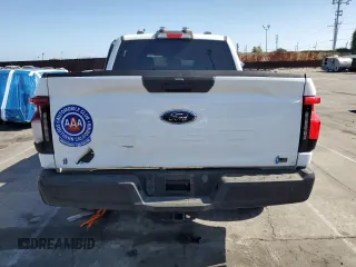 2023 Ford F-150 Lightning Pro с VIN 1FTVW1EL2PWG13712, выставлен на аукционе Copart как лот 56950955 с пробегом 60 605 миль миль и Списание • Salvage title. История ставок и продаж доступна на DreamBid. Изображение 6.