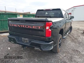 2021 Chevrolet Silverado 1500 LT Trail Boss with VIN 1GCPYFEDXMZ130455, listed as a IAAI auction lot 41140924 with 52,293 mi miles and . Bid and sale history available at DreamBid. Image 4.