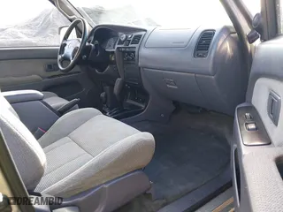 1999 Toyota 4Runner SR5 with VIN JT3HN86R3X0253157, listed as a IAAI auction lot 41539472 with 199,023 mi miles. Bid and sale history available at carsss.com. Image 5.