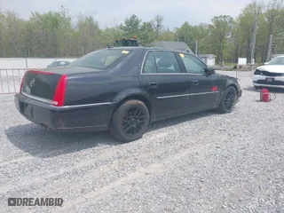 2007 Cadillac DTS Luxury I with VIN 1G6KD57YX7U151732, listed as a IAAI auction lot 42052946 with 187,483 mi miles. Bid and sale history available at carsss.com. Image 4.