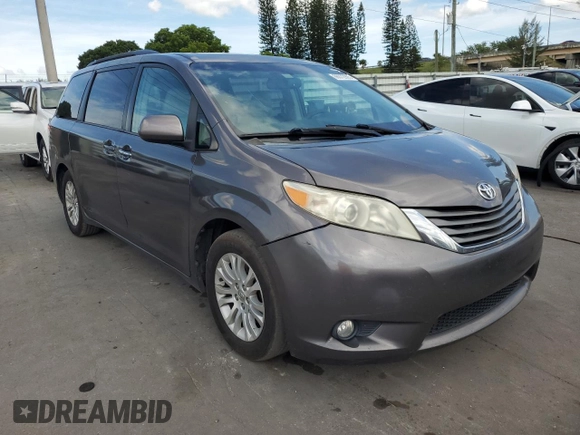 2013 Toyota Sienna XLE AAS with VIN 5TDYK3DC7DS389872, listed as a Copart auction lot 66072995 with 95,797 mi miles and Clean title. Bid and sale history available at DreamBid. Image 4.