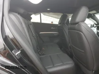 2022 Cadillac XT4 AWD Premium Luxury z VIN 1GYFZDR43NF132553, wystawiony jako Copart lot #50869955 z przebiegiem 25 412 mil mil oraz Szkody całkowita. Historia ofert i sprzedaży dostępna na DreamBid. Obrazek 11.