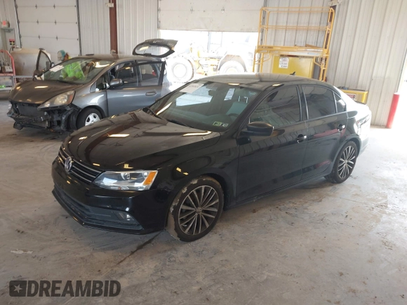 2015 Volkswagen Jetta SE with VIN 3VWD17AJ7FM415950, listed as a IAAI auction lot 42202024 with 107,877 mi miles and . Bid and sale history available at DreamBid. Image 2.