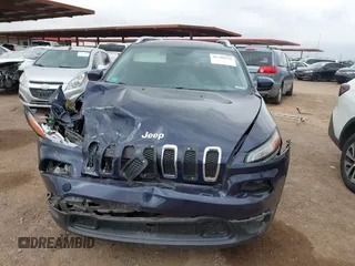 2015 Jeep Cherokee Latitude with VIN 1C4PJLCB8FW506398, listed as a IAAI auction lot 41796516 with 95,204 mi miles and . Bid and sale history available at DreamBid. Image 11.