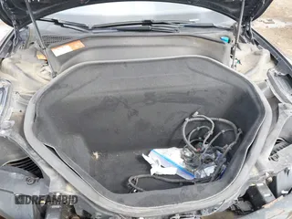 2015 Tesla Model S 85D with VIN 5YJSA1E21FF116775, listed as a IAAI auction lot 41876772 with 128,805 mi miles. Bid and sale history available at carsss.com. Image 10.