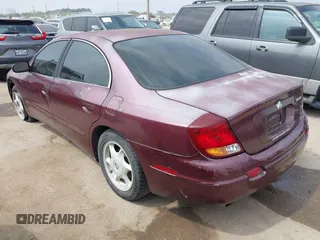 2003 Oldsmobile Aurora z VIN 1G3GS64C234156408, wystawiony jako IAAI lot #41807651 z przebiegiem 146 136 mil mil oraz . Historia ofert i sprzedaży dostępna na DreamBid. Obrazek 3.