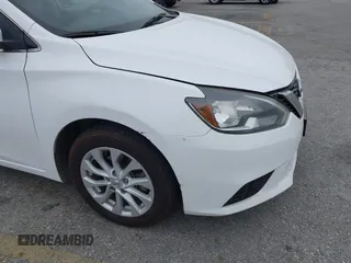 2018 Nissan Sentra S with VIN 3N1AB7AP6JY280214, listed as a IAAI auction lot 42173409 with 142,852 mi miles and . Bid and sale history available at DreamBid. Image 13.