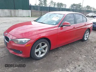 2014 BMW 3 Series 320i xDrive with VIN WBA3C3G5XENS69749, listed as a IAAI auction lot 42052481 with 112,306 mi miles and . Bid and sale history available at carsss.com. Image 2.