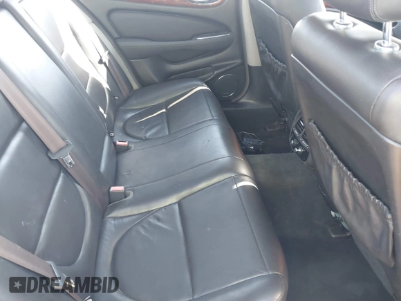 2004 Jaguar XJ with VIN SAJEA71C94SG01362, listed as a IAAI auction lot 41829470 with 172,545 mi miles. Bid and sale history available at carsss.com. Image 8.