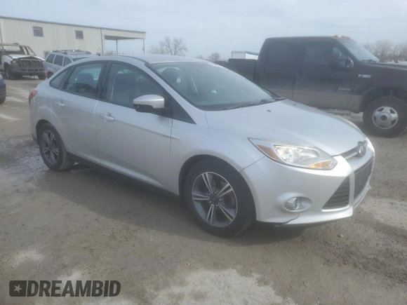 2014 Ford Focus SE with VIN 1FADP3F24EL264003, listed as a Copart auction lot 43800485 with 138,390 mi miles and Salvage Title. Bid and sale history available at DreamBid. Image 4.
