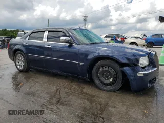 2005 Chrysler 300 C z VIN 2C3AA63HX5H636373, wystawiony jako Copart lot #56900065 z przebiegiem 137 287 mil mil oraz Szkoda całkowita • Salvage title. Historia ofert i sprzedaży dostępna na DreamBid. Obrazek 4.