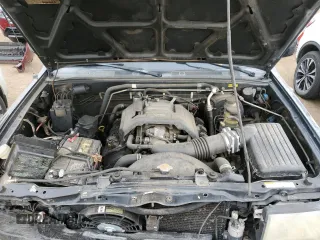 1999 Isuzu Rodeo S with VIN 4S2CM58W4X4339262, listed as a Copart auction lot 82804154 with 177,097 mi miles and Salvage Title. Bid and sale history available at carsss.com. Image 13.