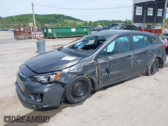 2018 Subaru Impreza with VIN 4S3GTAA60J3731249, listed as a IAAI auction lot 42294911 with 73,342 mi miles and . Bid and sale history available at DreamBid. Image 2.