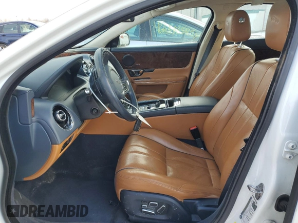 2015 Jaguar XJ Portfolio z VIN SAJWJ2GD5F8V77355, wystawiony jako Copart lot #47214835 z przebiegiem 73 202 mil mil oraz Szkoda całkowita • Salvage title. Historia ofert i sprzedaży dostępna na DreamBid. Obrazek 7.