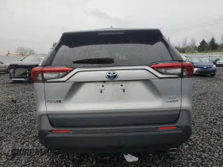 2024 Toyota RAV4 Hybrid XLE Premium with VIN 2T3B6RFV6RW066043, listed as a Copart auction lot 43470115 with 9,454 mi miles and Salvage Title. Bid and sale history available at DreamBid. Image 6.