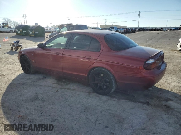 2005 Jaguar S-Type with VIN SAJWA03V451N43191, listed as a Copart auction lot 88491545 with 121,973 mi miles and Salvage Title. Bid and sale history available at DreamBid. Image 2.