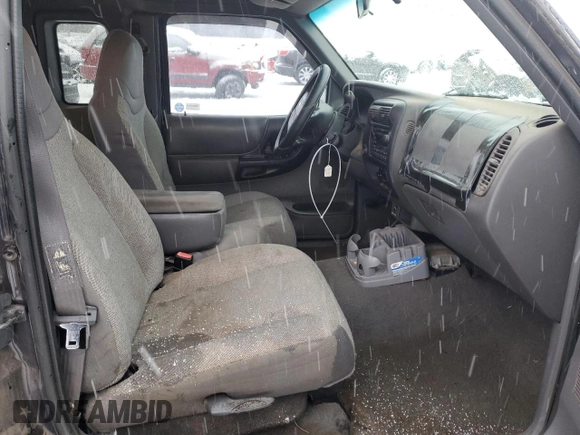 2001 Ford Ranger XLT Appearance with VIN 1FTYR14E11PA62827, listed as a Copart auction lot 87845045 with 142,748 mi miles and Salvage Title. Bid and sale history available at DreamBid. Image 11.