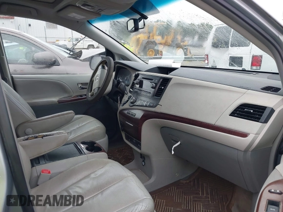 2012 Toyota Sienna XLE AAS with VIN 5TDYK3DC6CS243008, listed as a IAAI auction lot 40351580 with 157,752 mi miles and . Bid and sale history available at DreamBid. Image 5.