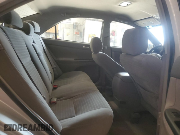 2005 Toyota Camry STD z VIN 4T1BE32K75U044292, wystawiony jako Copart lot #55299475 z przebiegiem 200 449 mil mil oraz Szkoda całkowita • Salvage title. Historia ofert i sprzedaży dostępna na DreamBid. Obrazek 10.