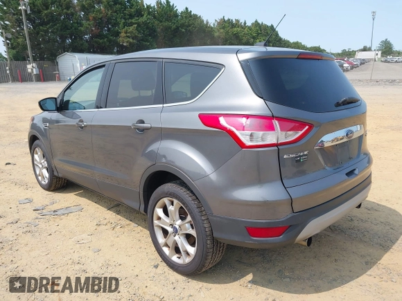 2013 Ford Escape SEL with VIN 1FMCU9H99DUC25469, listed as a IAAI auction lot 42402148 with 99,830 mi miles and . Bid and sale history available at DreamBid. Image 3.