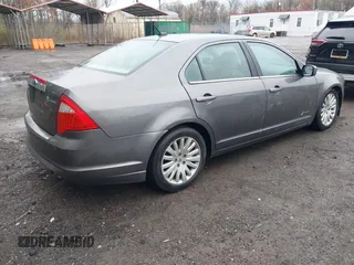 2012 Ford Fusion Hybrid with VIN 3FADP0L34CR215667, listed as a IAAI auction lot 41957936 with 158,914 mi miles and . Bid and sale history available at DreamBid. Image 4.