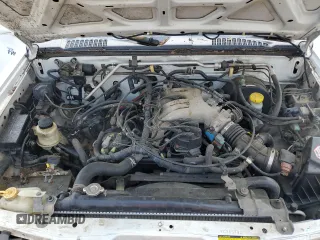 2000 Nissan Frontier XE with VIN 1N6ED27T1YC385792, listed as a Copart auction lot 62268225 with 291,906 mi miles and Salvage title. Bid and sale history available at DreamBid. Image 11.
