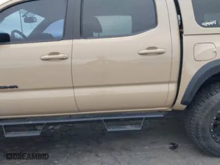 2016 Toyota Tacoma SR with VIN 3TMCZ5AN1GM018850, listed as a IAAI auction lot 41884584 with 65,634 mi miles. Bid and sale history available at carsss.com. Image 6.