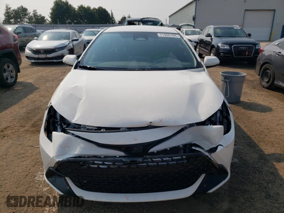 2025 Toyota Corolla Hatchback with VIN JTNK4MBEXS3233751, listed as a Copart auction lot 71455194 with 4,006 mi miles and Salvage Title. Bid and sale history available at carsss.com. Image 5.