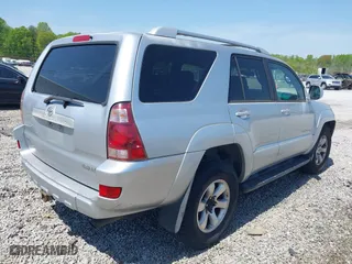 2004 Toyota 4Runner SR5 with VIN JTEBU14R448015129, listed as a IAAI auction lot 42040611 with 243,818 mi miles. Bid and sale history available at carsss.com. Image 4.