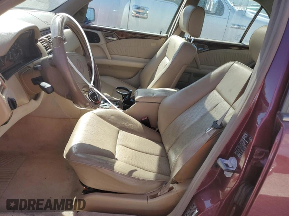 1998 Mercedes-Benz E-Class with VIN WDBJF65F1WA437851, listed as a Copart auction lot 74828054 with 189,748 mi miles and Salvage Title. Bid and sale history available at carsss.com. Image 7.