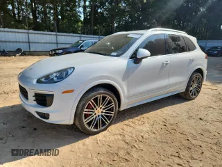 2015 Porsche Cayenne S with VIN WP1AB2A24FLA59813, listed as a Copart auction lot 60604305 with 137,719 mi miles and Salvage title. Bid and sale history available at DreamBid. Image 1.