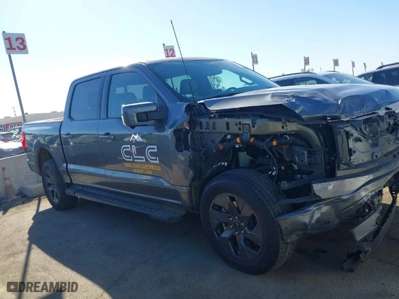 2022 Ford F-150 Lightning Pro with VIN 1FTVW1EL9NWG16717, listed as a IAAI auction lot 41290556 with 24,865 mi miles. Bid and sale history available at carsss.com. Image 13.
