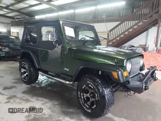 1998 Jeep Wrangler SE with VIN 1J4FY29P2WP733255, listed as a IAAI auction lot 41554602 with 157,316 mi miles. Bid and sale history available at carsss.com. Image 13.