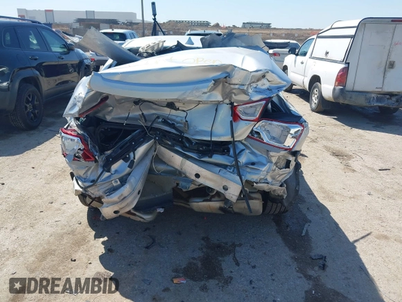 2014 Chevrolet Impala LT with VIN 2G1125S35E9102161, listed as a IAAI auction lot 41976891 with 129,408 mi miles and . Bid and sale history available at DreamBid. Image 6.