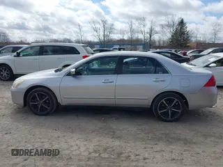 2006 Honda Accord LX with VIN 1HGCM66346A027051, listed as a IAAI auction lot 41881729 with 117,409 mi miles and . Bid and sale history available at DreamBid. Image 14.