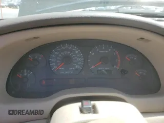 2003 Ford Mustang GT Deluxe z VIN 1FAFP45X23F436939, wystawiony jako Copart lot #61106135 z przebiegiem 105 860 mil mil oraz Czysty tytuł • Clean title. Historia ofert i sprzedaży dostępna na DreamBid. Obrazek 9.