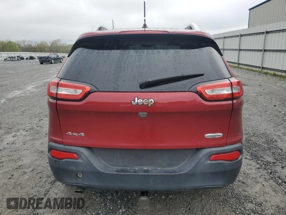2014 Jeep Cherokee Altitude with VIN 1C4PJMCB7EW141684, listed as a Copart auction lot 51260065 with 163,656 mi miles and Salvage Title. Bid and sale history available at carsss.com. Image 6.