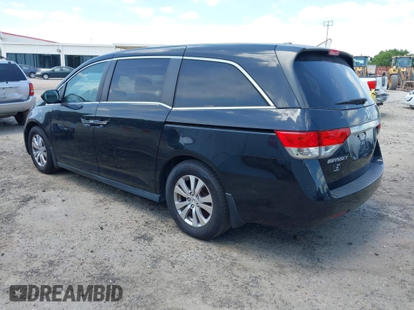 2014 Honda Odyssey EX-L with VIN 5FNRL5H66EB062158, listed as a IAAI auction lot 42072020 with 211,278 mi miles and . Bid and sale history available at carsss.com. Image 3.
